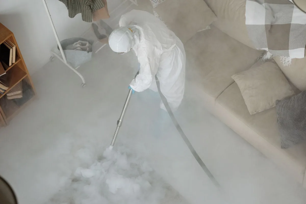 Biohazard cleanup technician in protective equipment, Goshen, NY